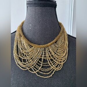 Elegant Gold coloured Beaded Necklace